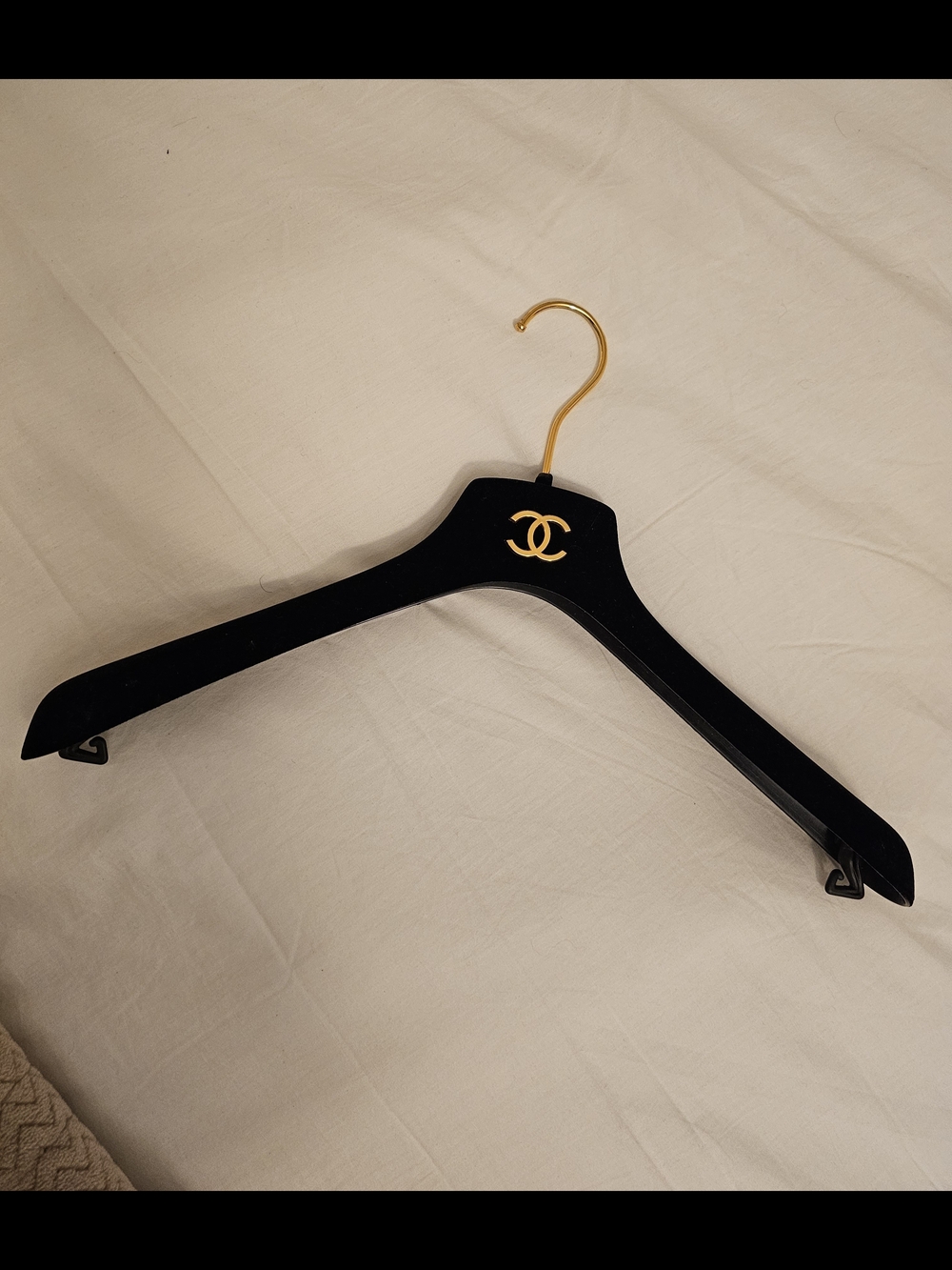 CHANEL Black Velvet Hanger with Gold CC Emblem and Hook